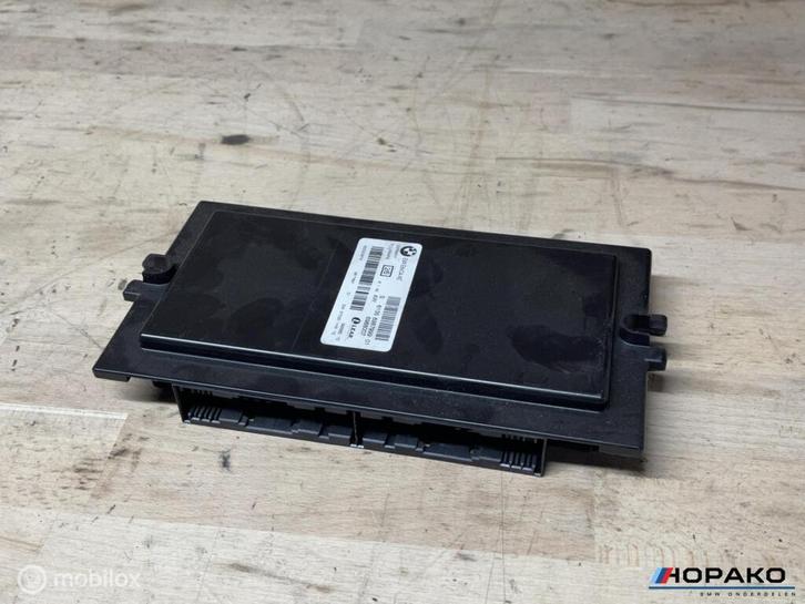 Lichtmodule FRM 2 BMW 1/3 serie E9x E8x | 6135698799901, Auto-onderdelen, Verlichting, Gebruikt, Ophalen of Verzenden