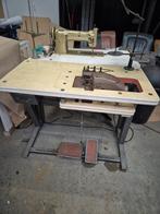 Industriele overlock naaimachine met gebogen naald, Ophalen, Naaimachine