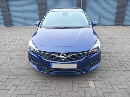 Opel Astra Break Turbo D Navy blue 2021, Auto's, Opel, Particulier, Astra, ABS, Airbags, Airconditioning, Bluetooth, Boordcomputer