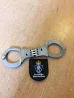 Handboeien lips met 1 sleutel, Ophalen of Verzenden, Zo goed als nieuw