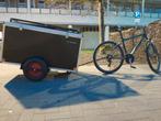 Fiets met aanhangwagen biketrailer, Ophalen
