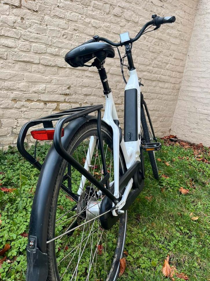 Velo électrique ville moteur central, Fietsen en Brommers, Elektrische fietsen, Zo goed als nieuw, Ophalen