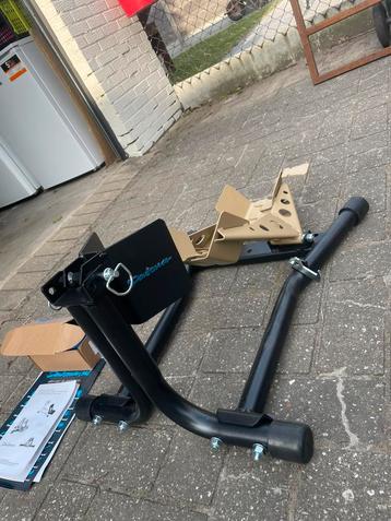 Inrijklem motor met spanbanden, Enlèvement