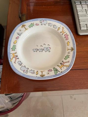 Een bordje met illustratie van john lennon van de beatles beschikbaar voor biedingen