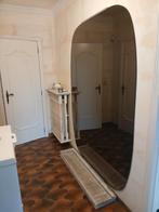 Miroir mural oval, Enlèvement