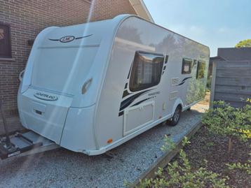 Caravan LMC Munsterland maestro 550d, Caravans en Kamperen, Caravans, Vast bed, Kachel, Rondzit, Particulier
