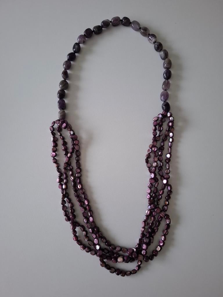 Paarse ketting gekocht bij mayerline, Ophalen