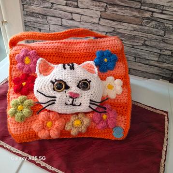 Poes rugzakje met vele bloemen, Ophalen of Verzenden, Nieuw, Haken, Wol of Garen