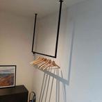 U Rail kapstok, Ophalen