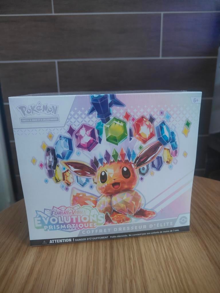 Coffret Dresseur d’Élite Pokémon – Évolutions Prismatique, Enlèvement