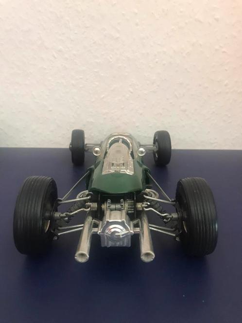 Schuco 1071 LOTUS Formel 1 NIEUWSTAAT- raceauto-oldtimer, Antiek en Kunst, Antiek | Speelgoed, Verzenden