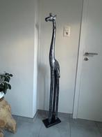 Statige houten giraf, Ophalen