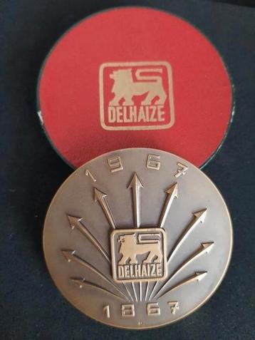 Médaille  bronze centenaire DELHAIZE disponible aux enchères