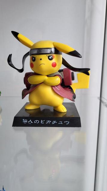 Pikachu figurine in Naruto costume