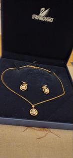 Swarovski set collier en oorbellen, Enlèvement