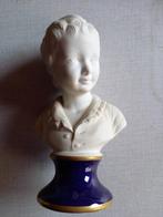 wit borstbeeldje op blauwe voet, Ophalen