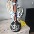 fles wijn van het jaar 1912, Diversen, Ophalen