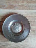 plateau en étain, Enlèvement