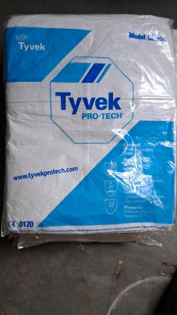 Witte, gele en blauwe plastic overal + handschoenen  beschikbaar voor biedingen