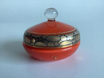 glazen oranje art deco poederdoos beschikbaar voor biedingen