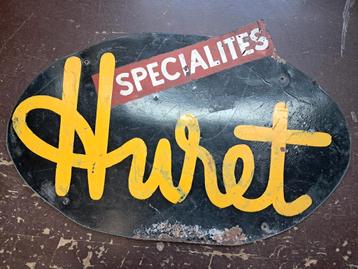 Oude reclamebord Huret beschikbaar voor biedingen