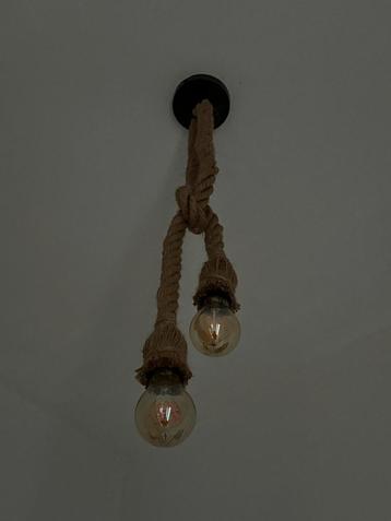 Suspension en corde, Comme neuf