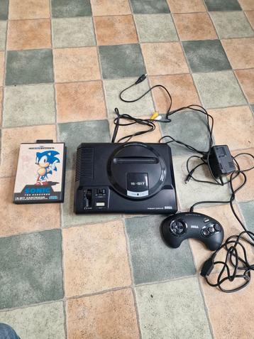 Sega Mega Drive + 1 manette + Sonic en boîte avec notice disponible aux enchères