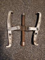 Poelietrekker/ lagertrekker, Ophalen