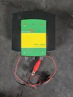 Stroomapparaat + batterij + oplader + paaltjes en draad