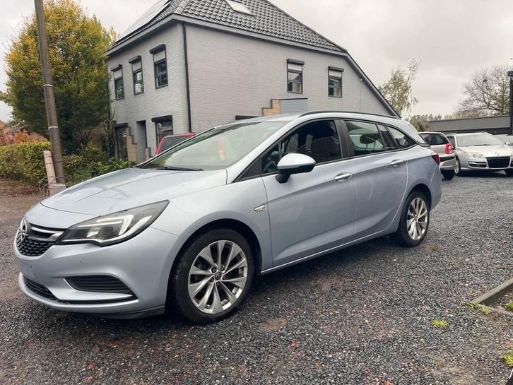 Opel Astra 1.4 Turbo Sports Tourer,Airco,Gps,Sensoren,.., Auto's, Opel, Particulier, Te koop, Astra, ABS, Airbags, Airconditioning