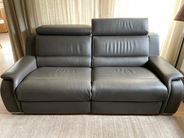 lederen zetel met 2 x relaxfunctie beschikbaar voor biedingen