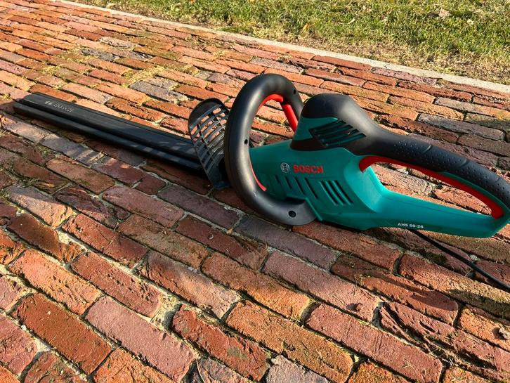 Bosch AHS 50-26 heggenschaar — 600W, 50 cm — werkt,, Tuin en Terras, Heggenscharen, Ophalen