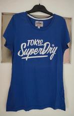 T-shirt "Superdry" bleu M (Petit) en très bon état!, Kleding | Dames, T-shirts, Gedragen, Blauw, Superdry, Ophalen of Verzenden