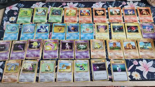 Pokemon 20th anniversary, 1st edition (65 kaarten), Hobby en Vrije tijd, Verzamelkaartspellen | Pokémon, Zo goed als nieuw, Meerdere kaarten