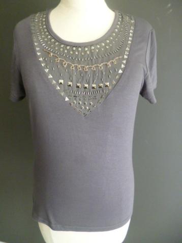 Overproduktie van Modieus Dames T-shirt met strasses beschikbaar voor biedingen