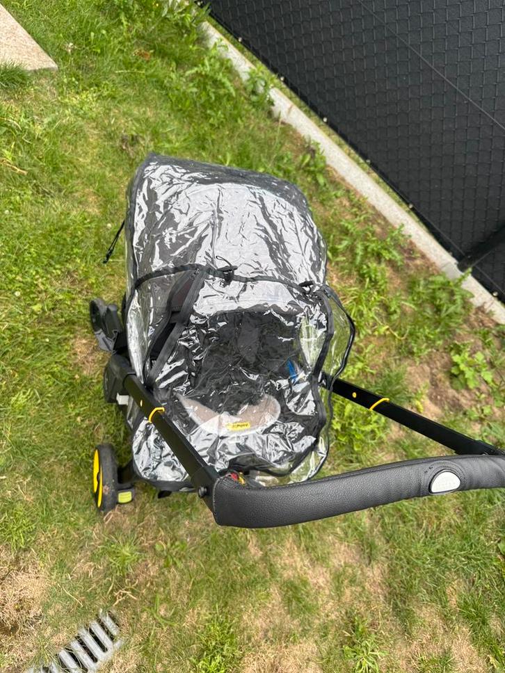 Doona - toebehoren, Kinderen en Baby's, Buggy's, Zo goed als nieuw, Overige merken, Regenhoes, Zonnekap, Ophalen