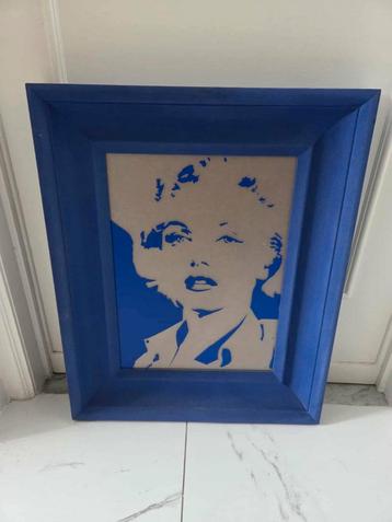 Marilyn Monroe wanddecoratie in blauwe lijst
 beschikbaar voor biedingen