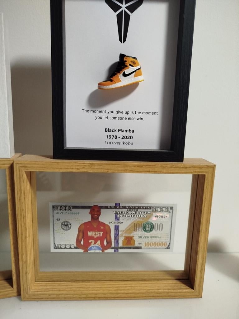 Gouden en zilveren Michael Jordan en Kobe Bryant, Ophalen