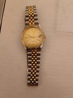 Quartz zilver/goudkleurig mannen horloge, Handtassen en Accessoires, Horloges | Heren, Ophalen of Verzenden, Gebruikt, Zilver