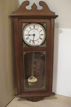 pendule klok, Ophalen