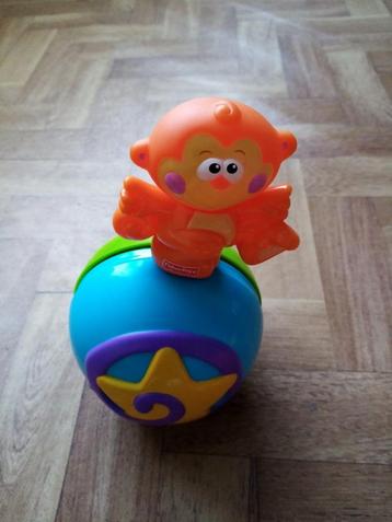 fisher price : aap op rollende bal met geluid beschikbaar voor biedingen