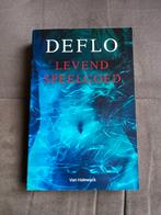 Luc Deflo - Levend speelgoed, Boeken, Thrillers, Gelezen, België, Ophalen of Verzenden, Luc Deflo