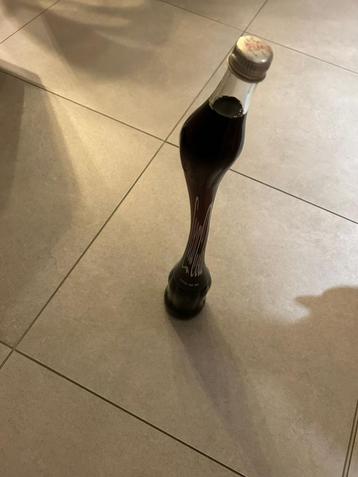Vintage coca cola fles, Enlèvement