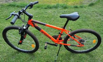 Rockrider 500 oranje fluo 24" B-Twin fiets