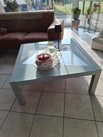 Glazen salontafel, Enlèvement