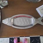 inox visschotel, Ophalen