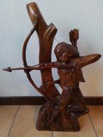 Indiaan in hout, Ophalen