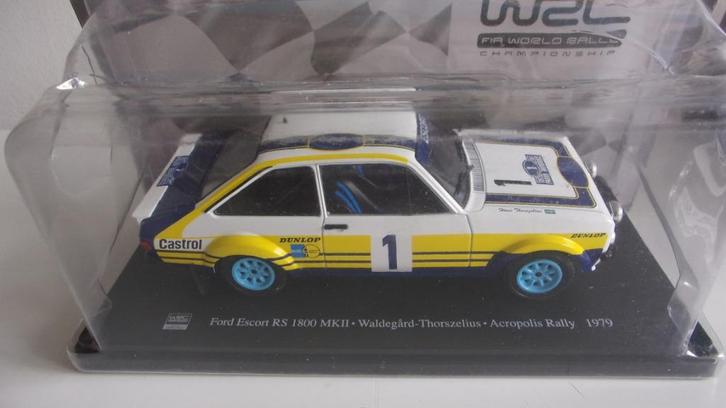 ESCORT RS 79.WALDEGAARD ACROPOLE 79.1/24 NEUVE,BLISTER ORIG., Hobby en Vrije tijd, Modelauto's | 1:24, Nieuw, Auto, Overige merken