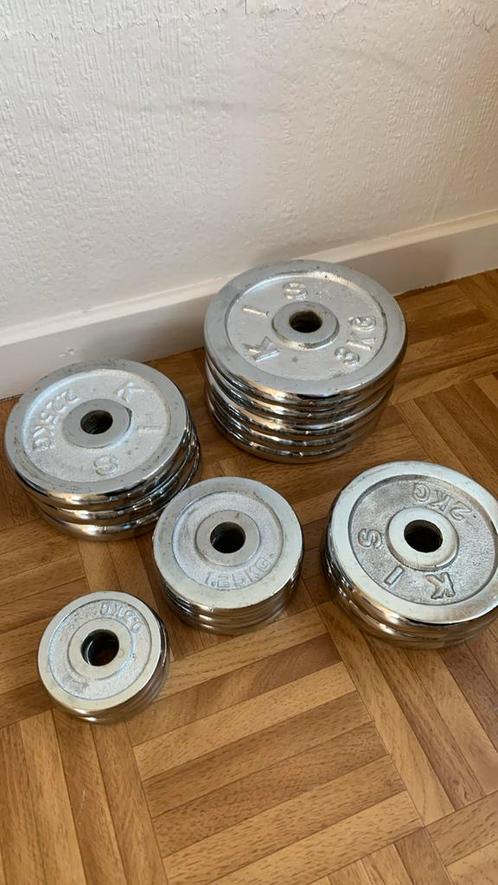 Set van gietijzeten schijven te koop, Sport en Fitness, Fitnessmaterialen, Zo goed als nieuw, Ophalen