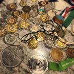 Medailles loopwedstrijden: marathons en dergelijke, Enlèvement